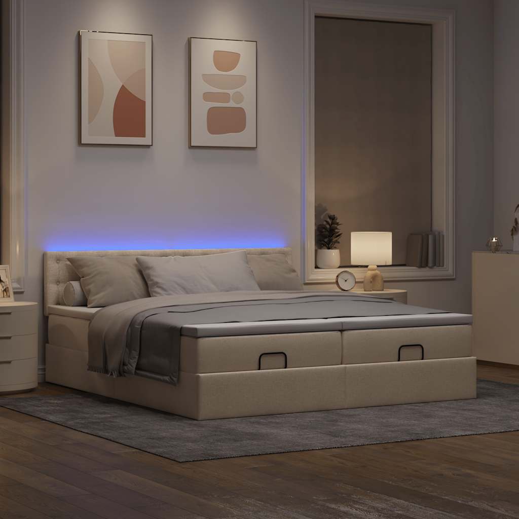 Otomanski posteljni okvir z vzmetnicami krem 180×200 cm blago