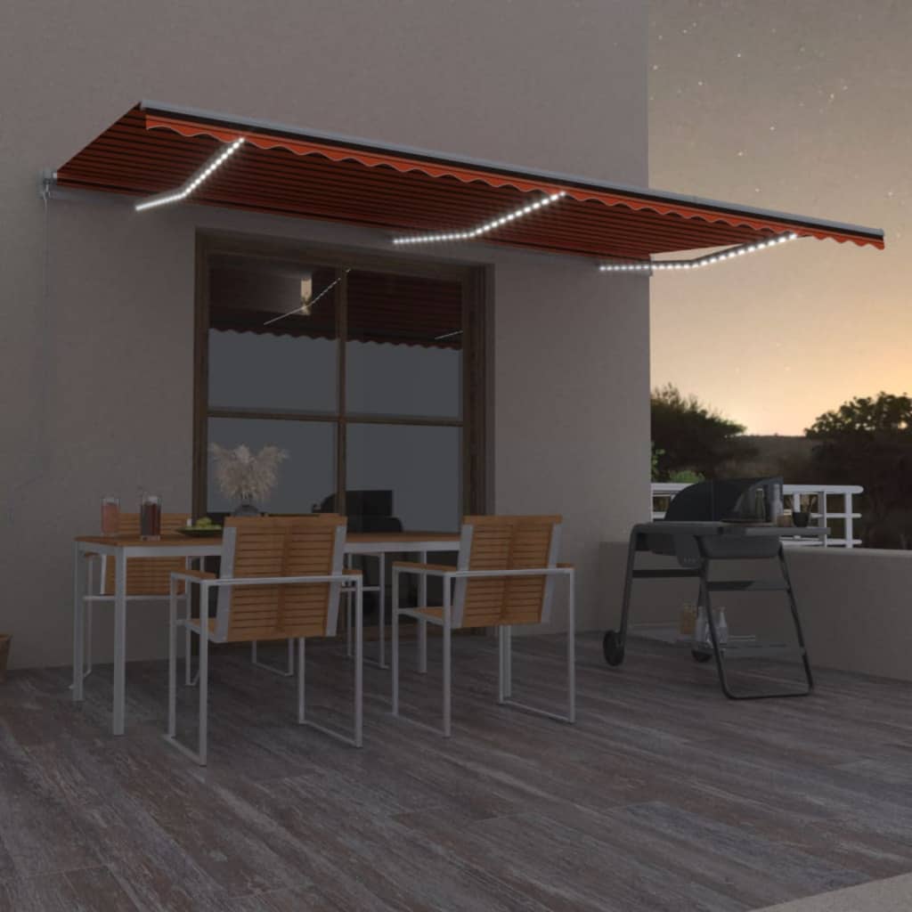 Ročno zložljiva tenda z LED lučmi 600×350 cm oranžna in rjava