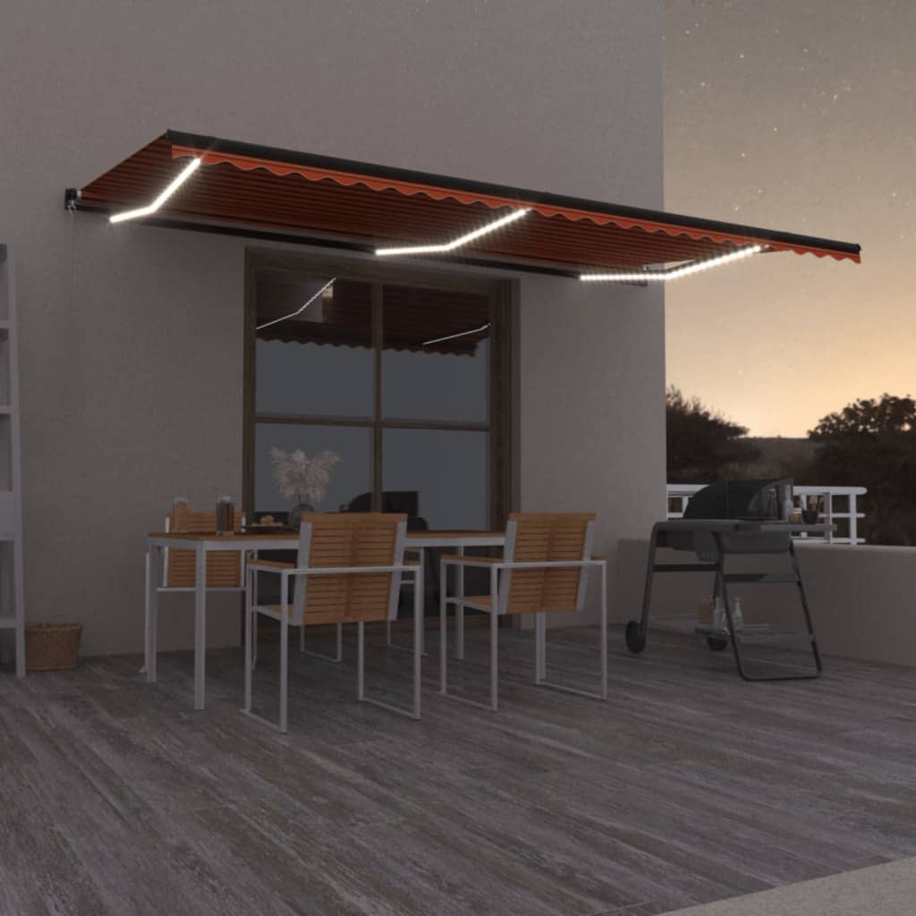 Ročno zložljiva tenda z LED lučmi 600×350 cm oranžna in rjava