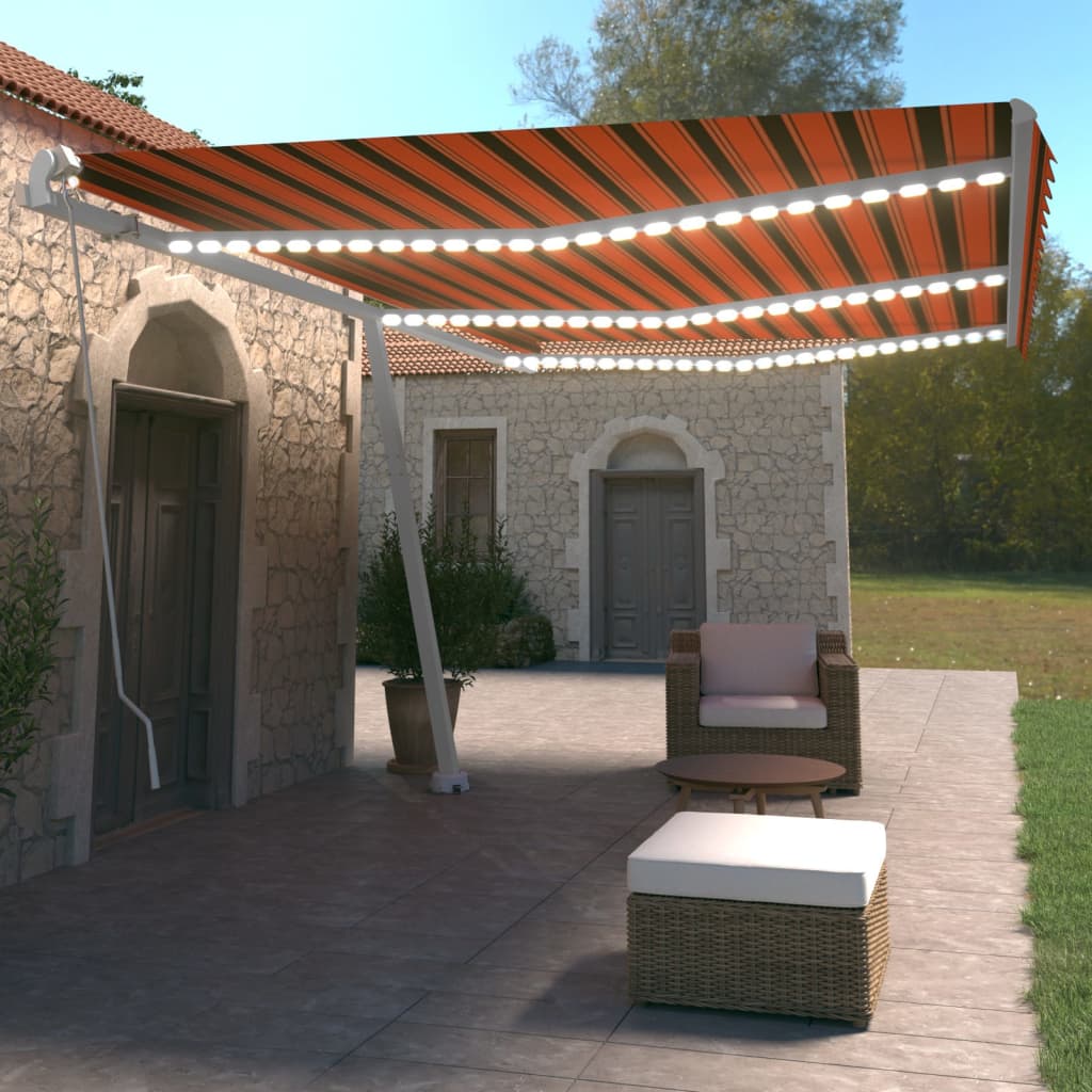 Ročno zložljiva tenda z LED lučmi 600×350 cm oranžna in rjava