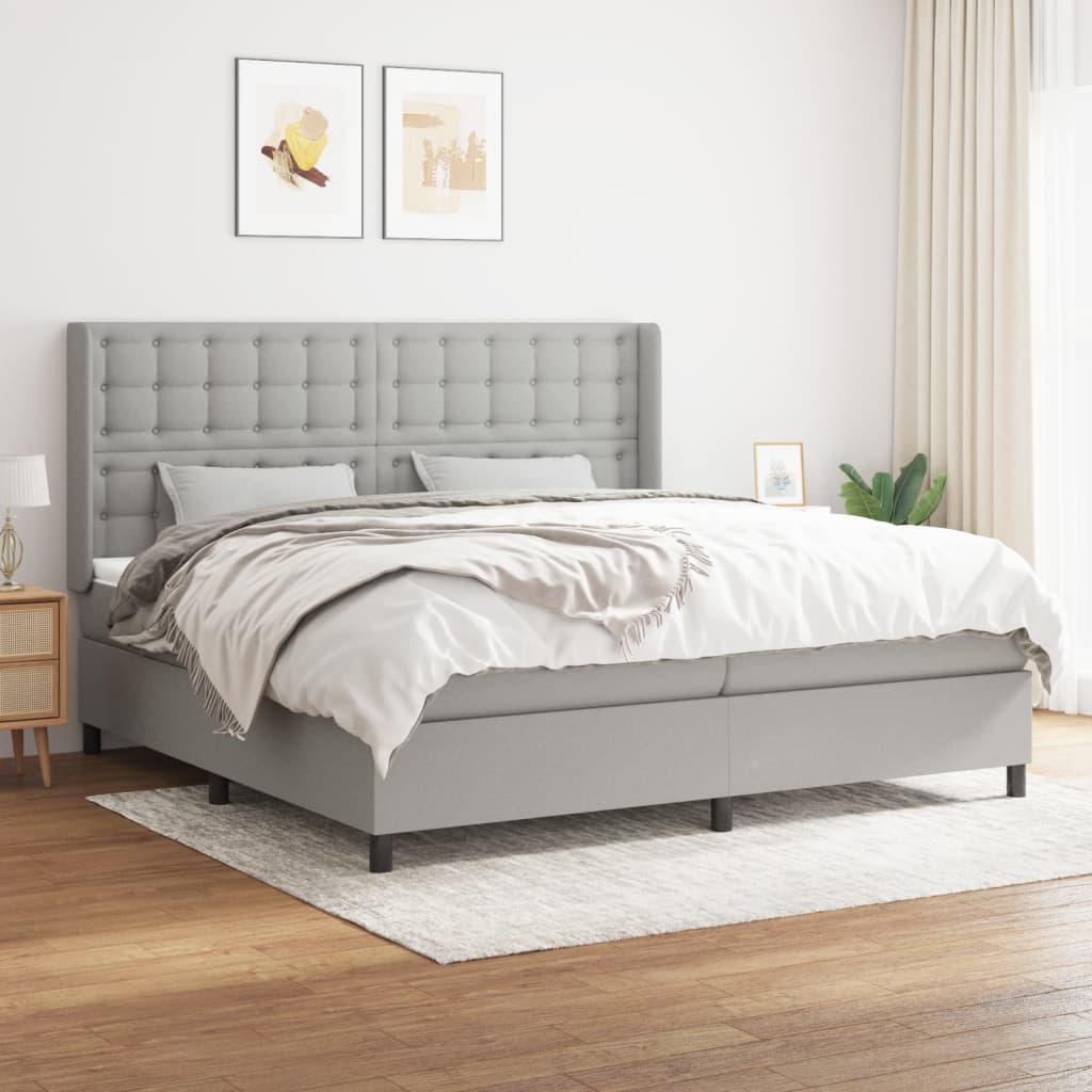 Box spring postelja z vzmetnico svetlo siva 200×200 cm blago