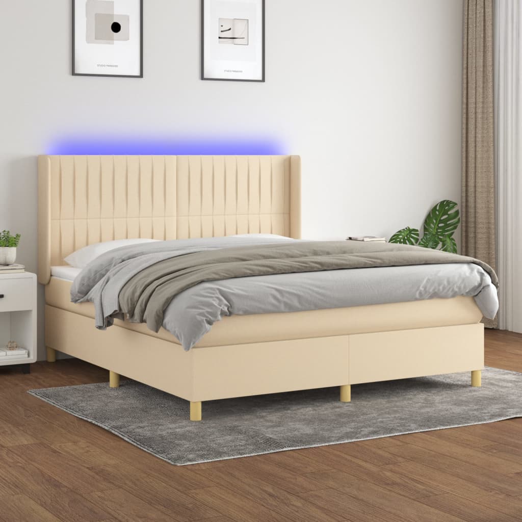 Box spring postelja z vzmetnico LED krem 180×200 cm blago