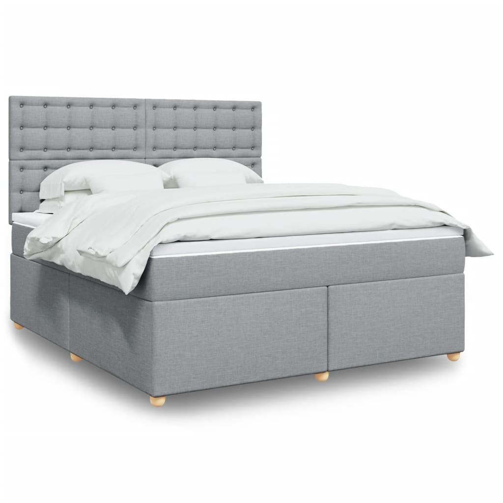 Box spring postelja z vzmetnico svetlo siva 180×200 cm blago