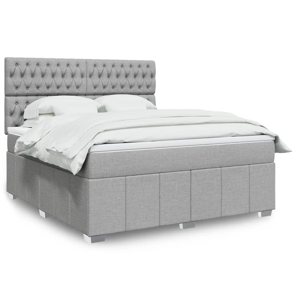 Box spring postelja z vzmetnico svetlo siva 180×200 cm blago
