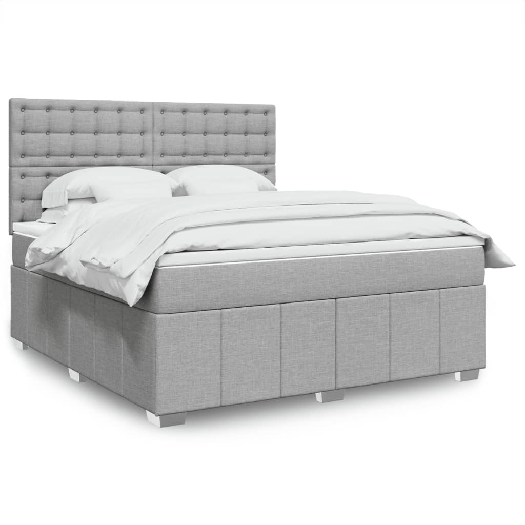 Box spring postelja z vzmetnico svetlo siva 180×200 cm blago