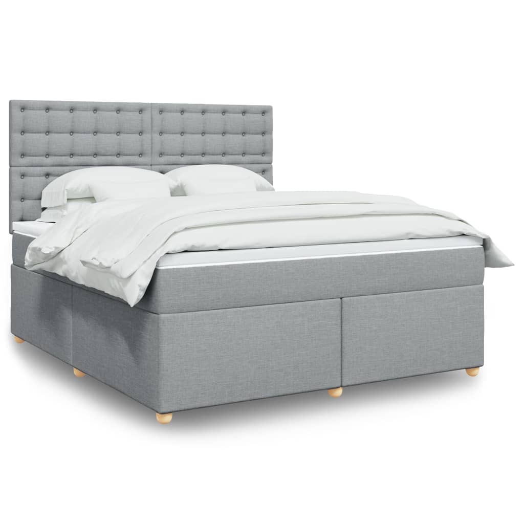 Box spring postelja z vzmetnico svetlo siva 180×200 cm blago