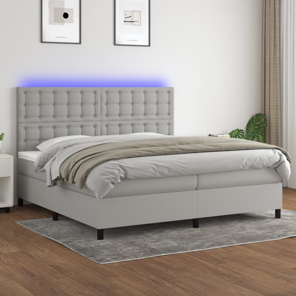 Box spring postelja z vzmetnico LED sv. siva 200×200 cm blago
