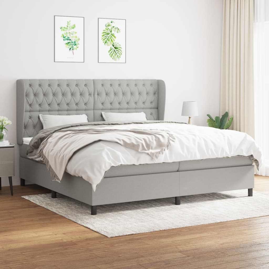 Box spring postelja z vzmetnico svetlo siva 200×200 cm blago