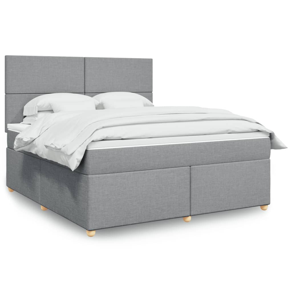 Box spring postelja z vzmetnico svetlo siva 180×200 cm blago